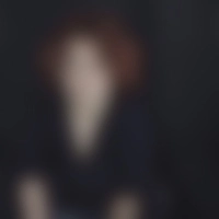 Photo d'une femme rousses sur un fond noir